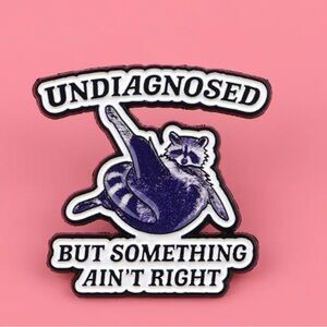 Undiagnosed but Something Ain’t Right Raccoon Enamel Pin